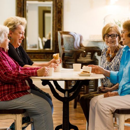 Civitas Senior Living | Seniors talking at a table