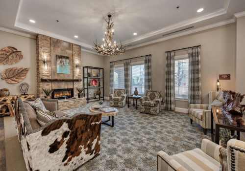 StoneCreek of Flying Horse | Living area with fireplace