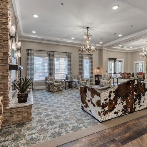 StoneCreek of Flying Horse | Living area with fireplace