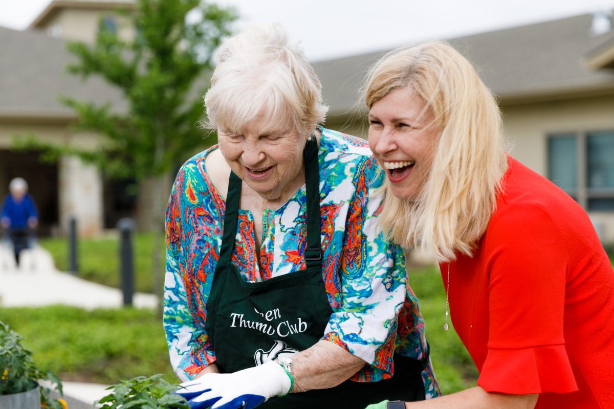 Civitas Senior Living | Senior working in a garden