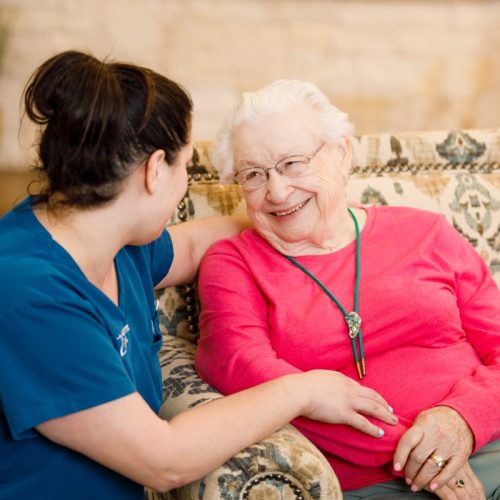 Civitas Senior Living | Senior woman talking with caregiver