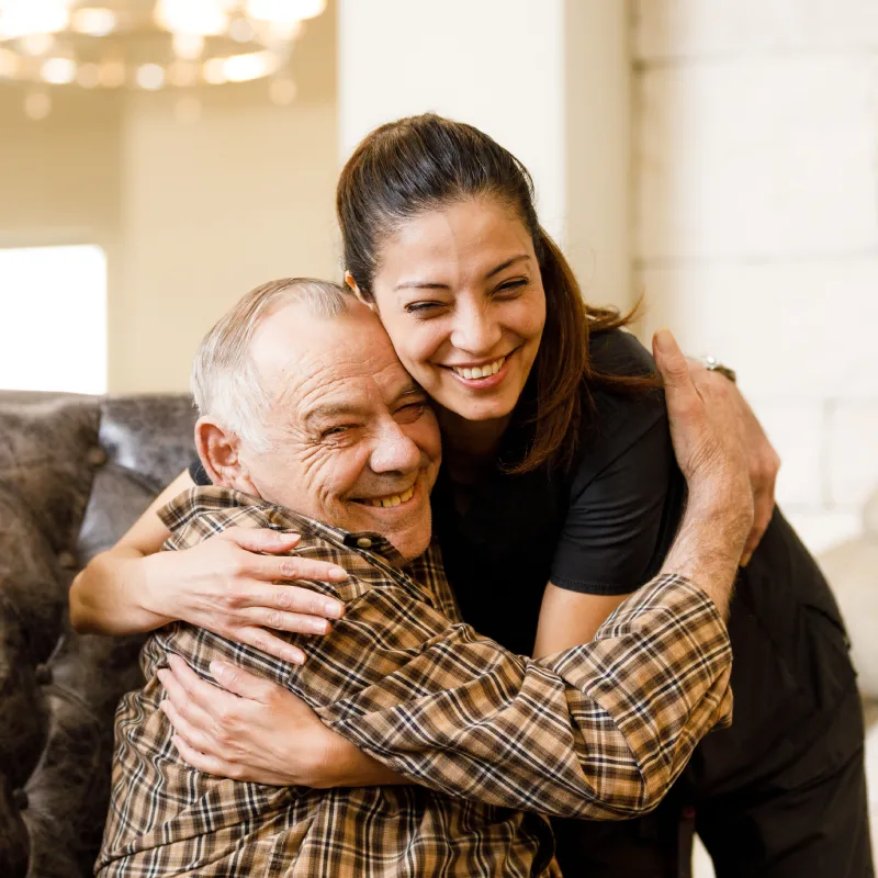 Civitas | Resident hugging team member