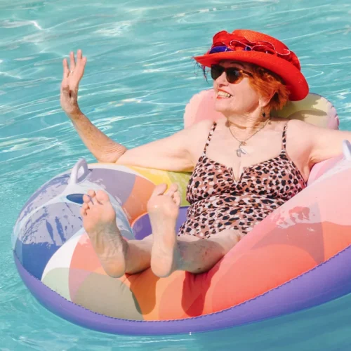 Midtowne | Senior woman relaxing in the pool