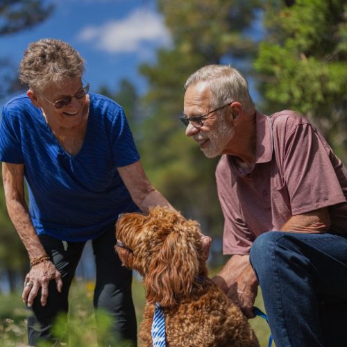 civitas-senior-living-senior-couple-outside-with-their-dog