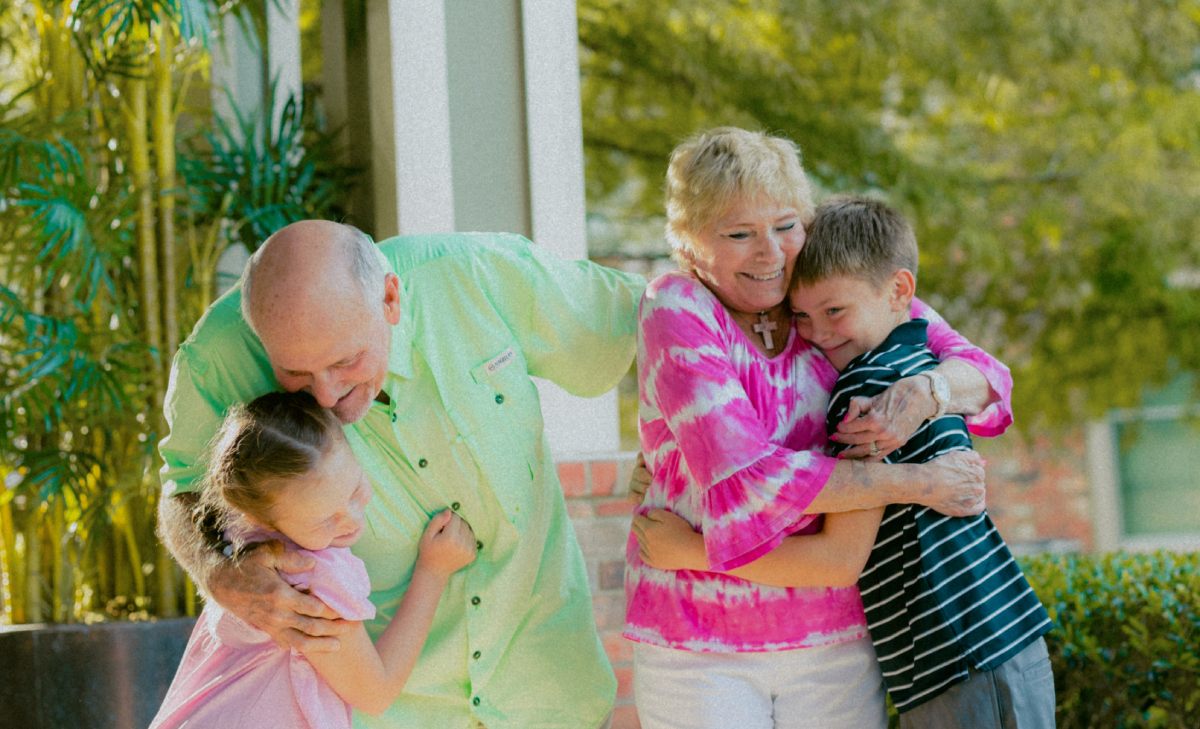 Civitas Senior Living | Senior hugging their grandchildren