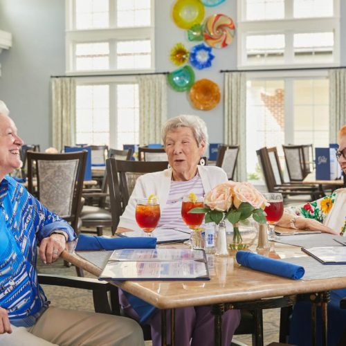 Civitas Senior Living | Senior women sitting around the dinner table