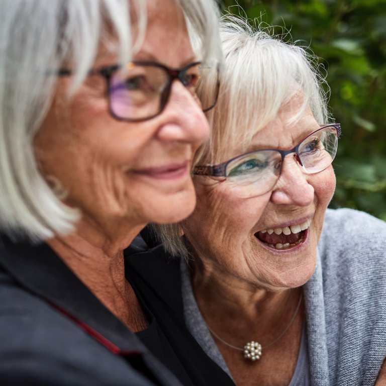 Harvest of Roanoke | Senior women hugging