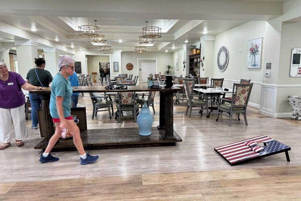 Residents Enjoy Indoor Cornhole Fun | Harvest of Roanoke