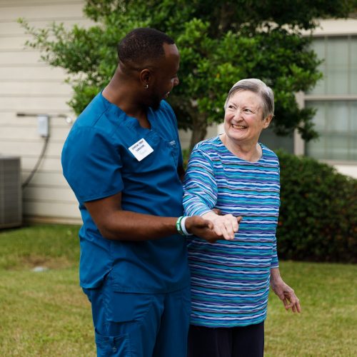 Civitas | Caregiver walking with resident