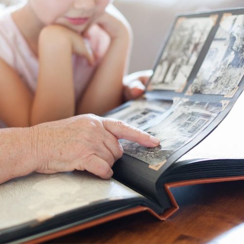Civitas Senior Living | Looking through a photo album
