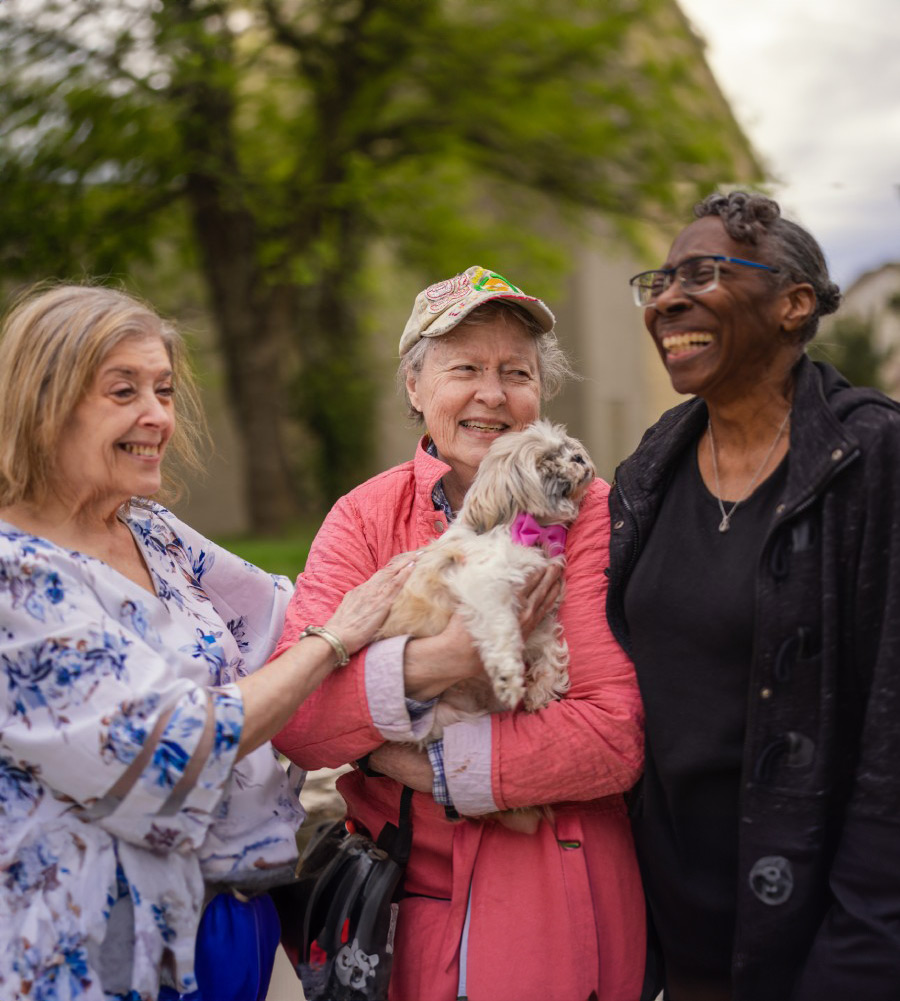 West Fork at Weatherford | Seniors petting a dog