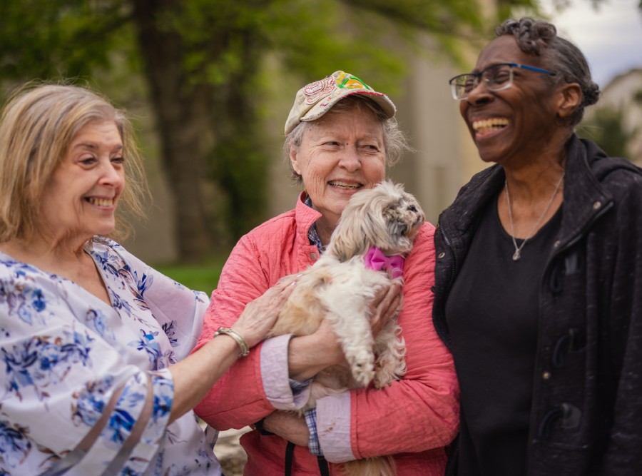 West Fork at Weatherford | Seniors petting a dog