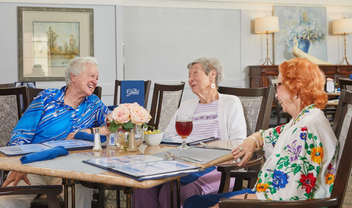 Civitas Senior Living | Seniors talking around a table