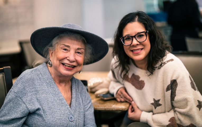 civitas-senior-living-two-women-sitting-together-smiling.jpg